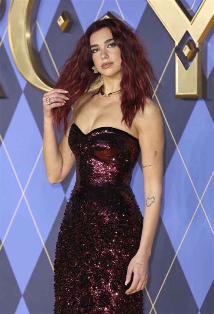 Dua Lipa and Callum Turner PDA-filled photos have fans 'falling to their knees'